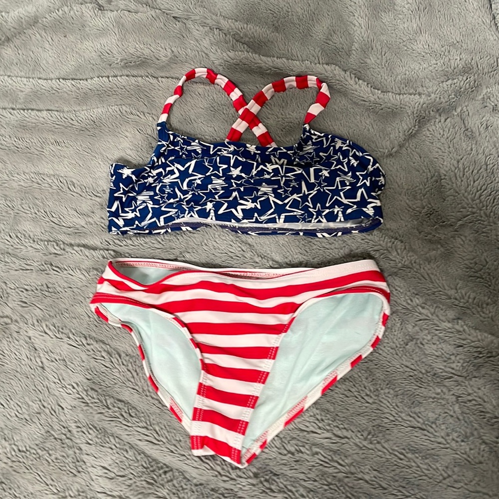It doesn’t have tags and has been worn a couple times but not in bad condition